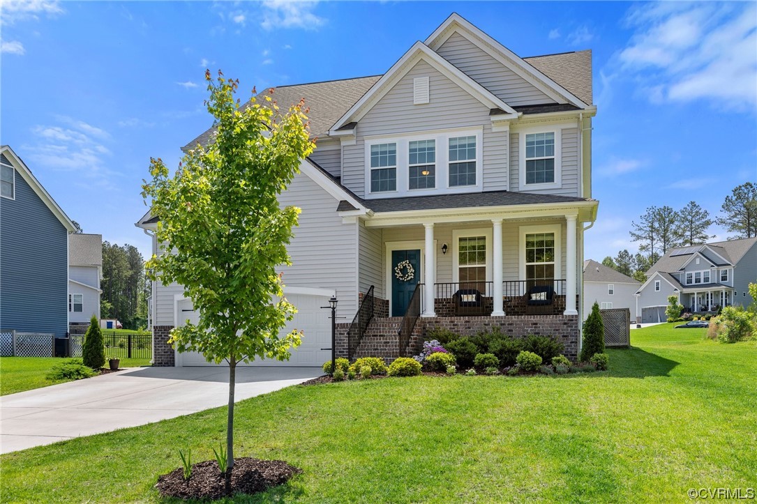 8125 Timberstone Drive Chesterfield, VA 23832 - Photo 2 of 34 a front view of a house with a yard