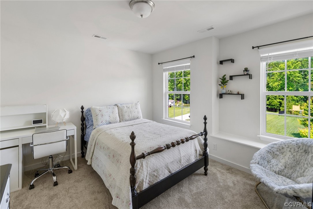 8125 Timberstone Drive Chesterfield, VA 23832 - Photo 23 of 34 a spacious bedroom with a bed and a window