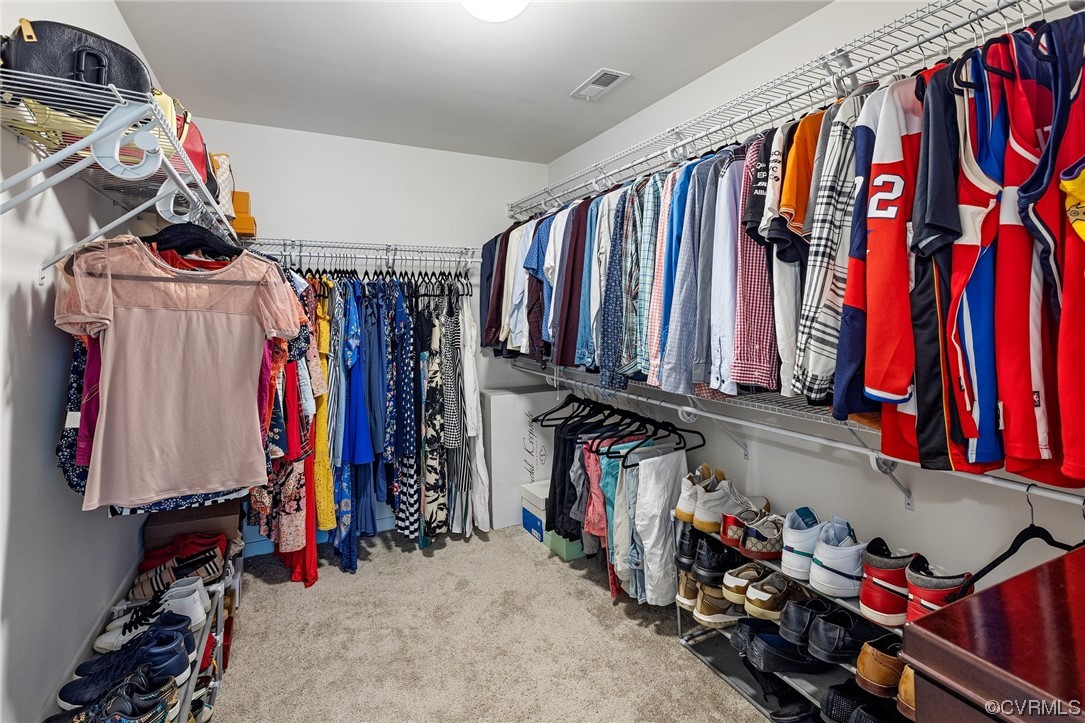 8125 Timberstone Drive Chesterfield, VA 23832 - Photo 29 of 34 a view of walk in closet with clothes