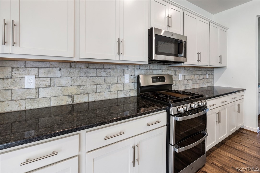 8125 Timberstone Drive Chesterfield, VA 23832 - Photo 10 of 34 a kitchen with granite countertop white cabinets stainless steel appliances and a sink