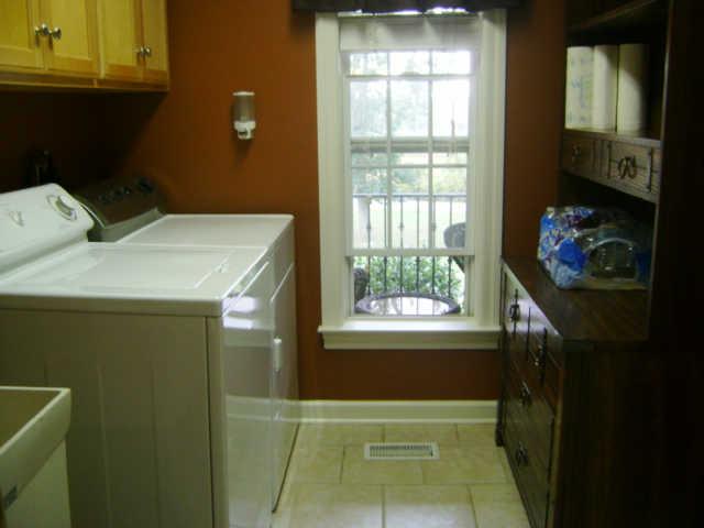 836 Holt Road Lebanon, TN 37087 - Photo 13 of 16 Utility room is extra large with sink, cabinet space. Room for hutch and extra shelving