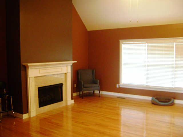 836 Holt Road Lebanon, TN 37087 - Photo 16 of 16 Home has open floor plan. Living room has hardwood floors, fireplace, and vaulted ceilings