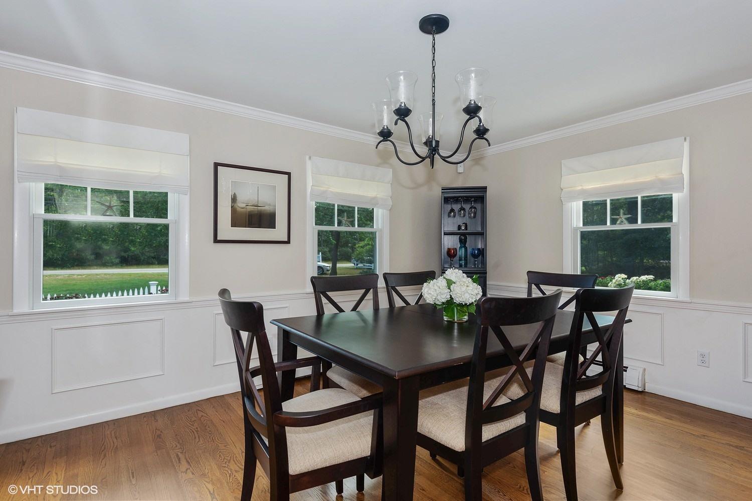 1166 Old Post Road Cotuit, MA 02635 - Photo 7 of 15 a view of a dining room with furniture window and wooden floor