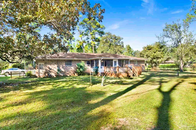 a view of a house with a swimming pool