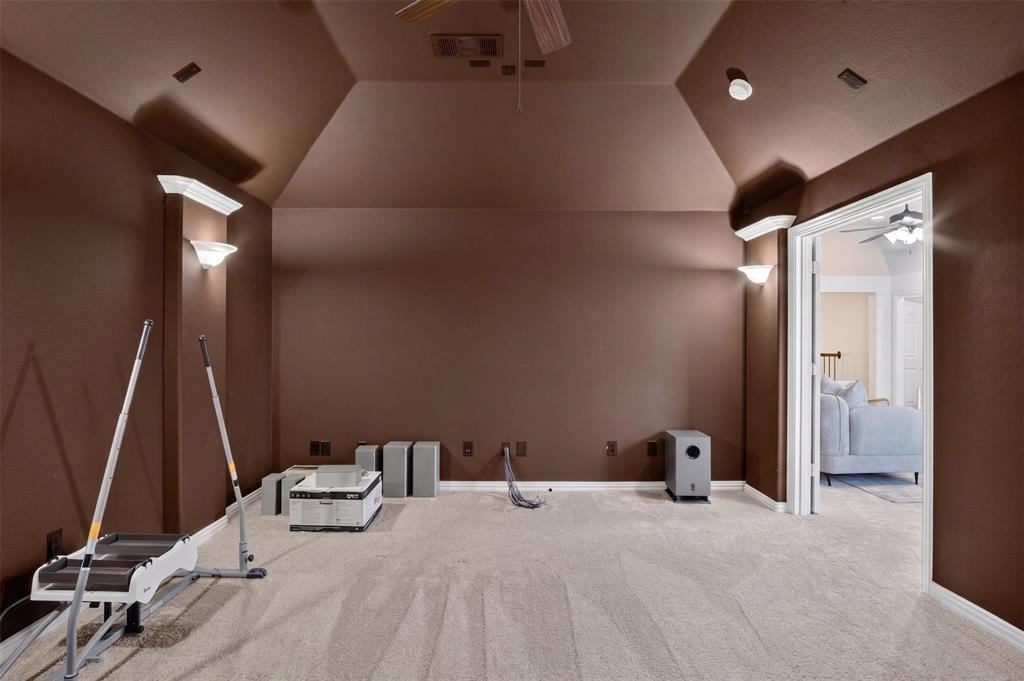 842 Sun Meadow Road Allen, TX 75013 - Photo 21 of 39 Carpeted room featuring a vaulted ceiling with a central fan and recessed lighting