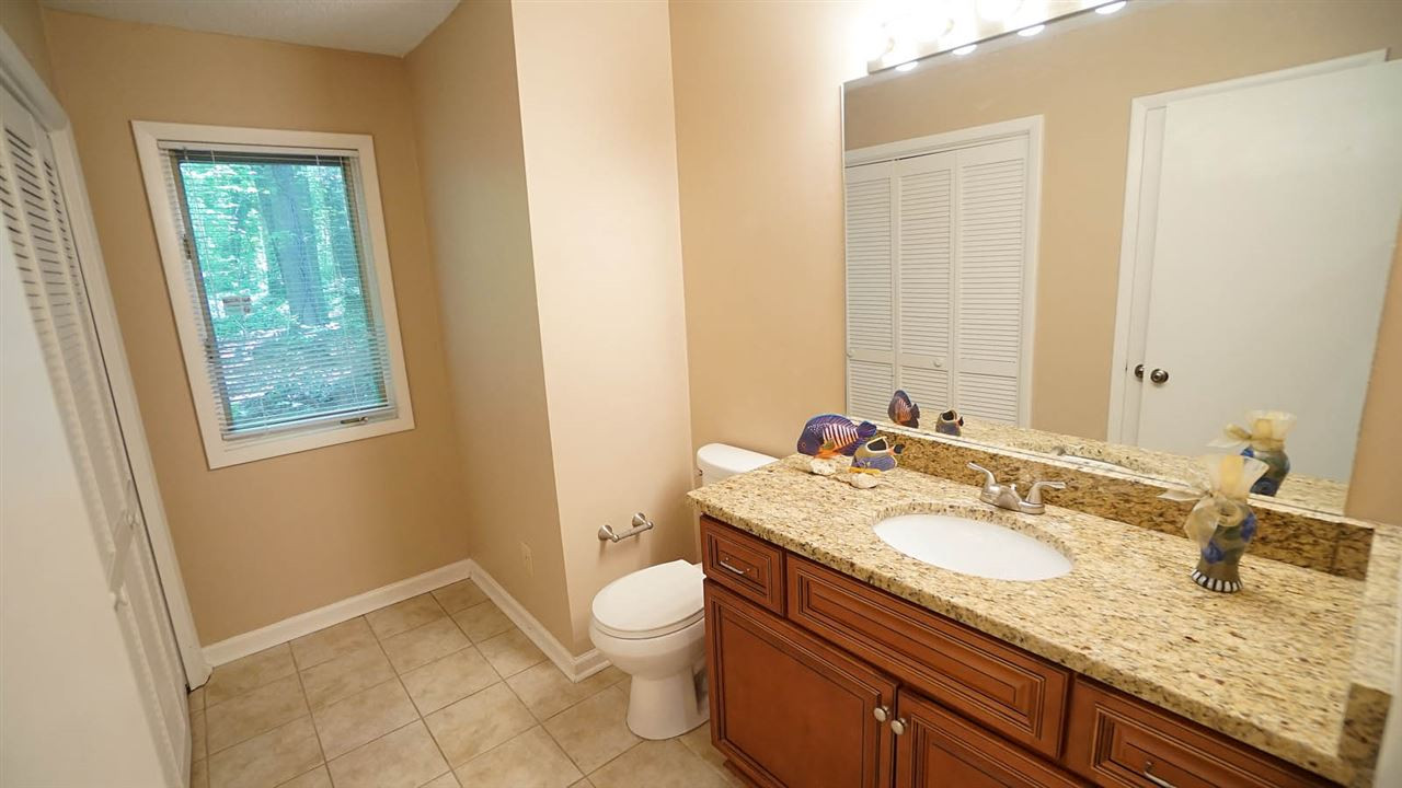 4301 Sun Belt Place Raleigh, NC 27613 - Photo 13 of 23 First Floor Half Bath has Laundry Closet + Linen Closet. Bathroom
