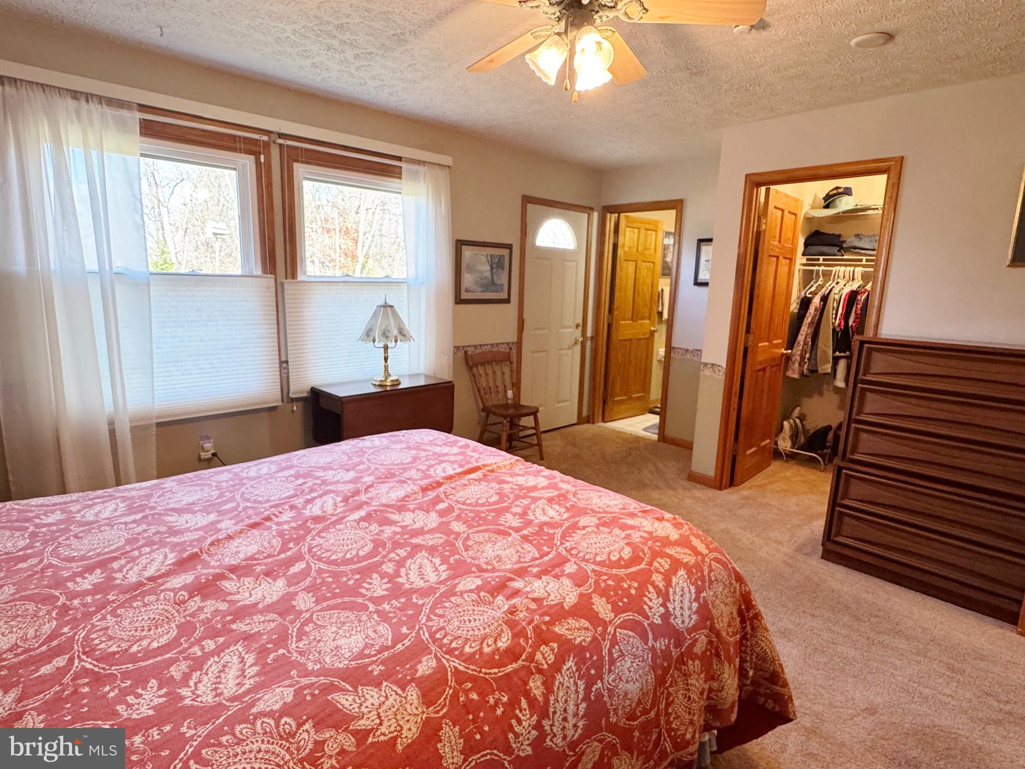 125 Brer Rabbit Road Rising Sun, MD 21911 - Photo 17 of 45 a bedroom with a bed and a dresser
