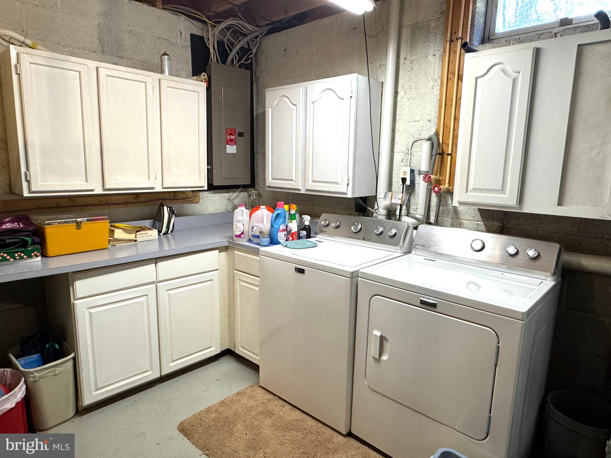 125 Brer Rabbit Road Rising Sun, MD 21911 - Photo 29 of 45 a utility room with cabinets a washer and dryer