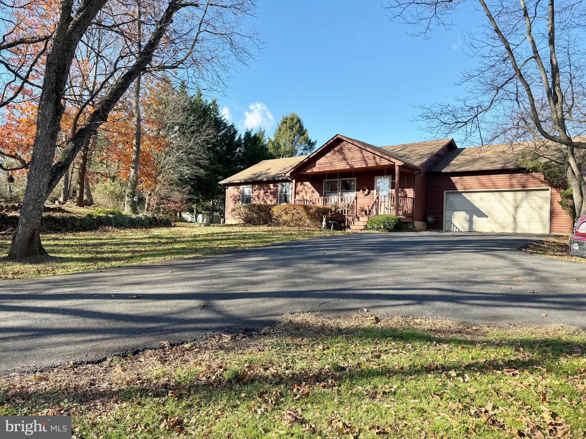 125 Brer Rabbit Road Rising Sun, MD 21911 - Photo 3 of 45 a front view of a house with a garden