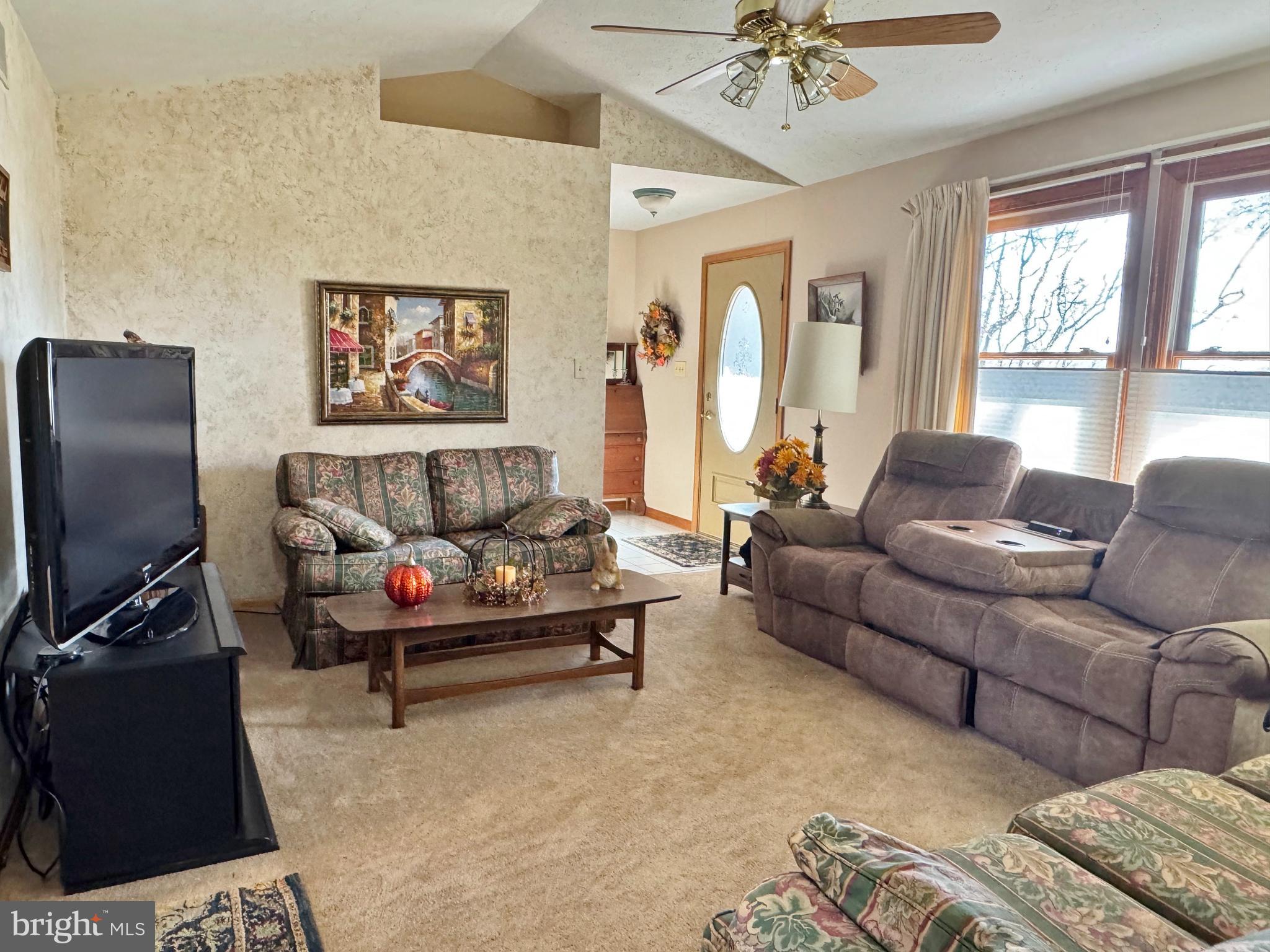 125 Brer Rabbit Road Rising Sun, MD 21911 - Photo 7 of 45 a living room with furniture and a flat screen tv