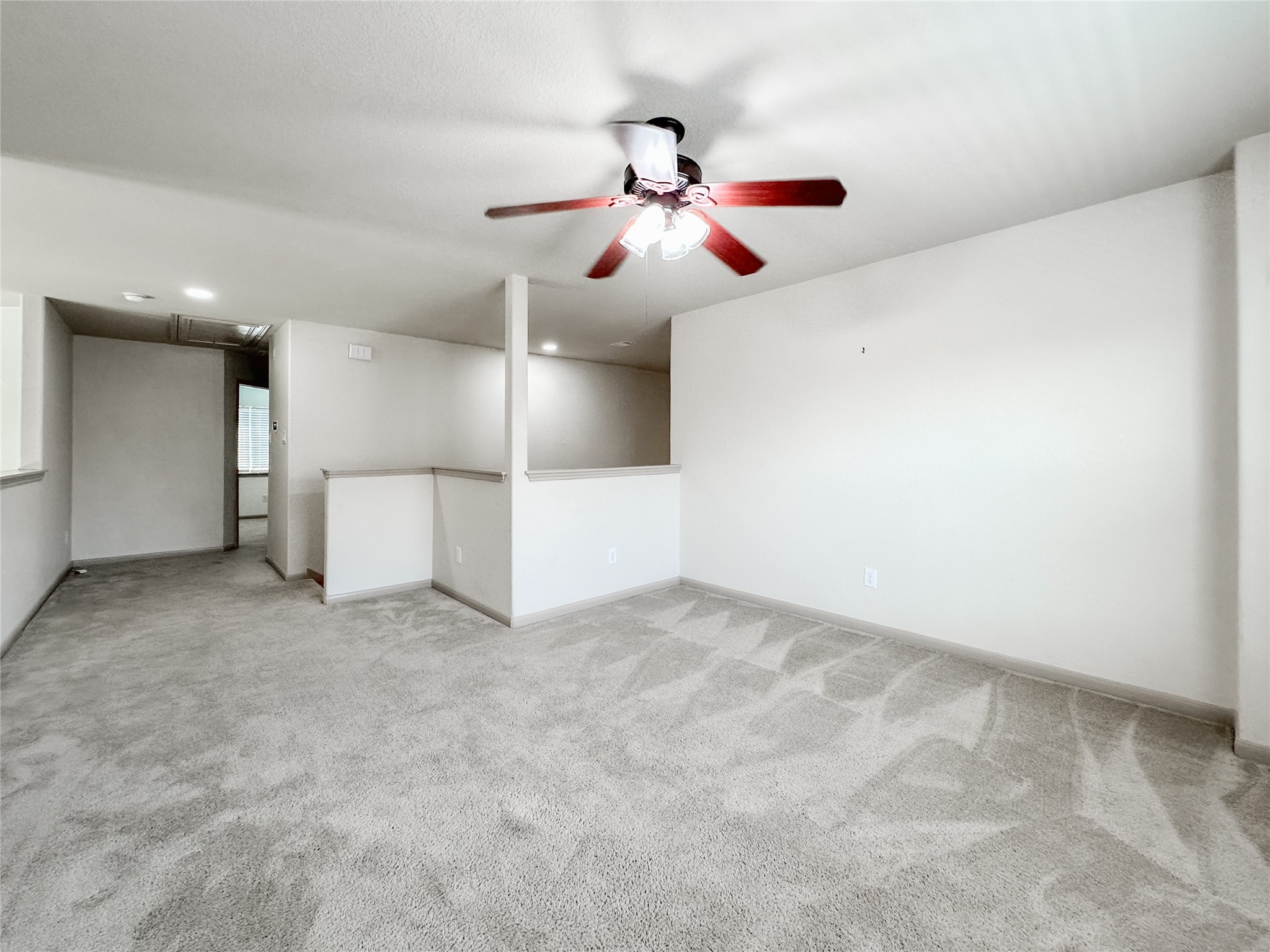 20319 Little Wing Drive Spring, TX 77388 - Photo 38 of 49 a view of a livingroom with a ceiling fan and window
