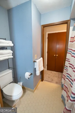 a bathroom with a sink and a toilet