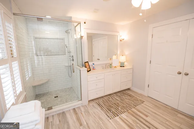 a kitchen with a sink a microwave a stove and refrigerator