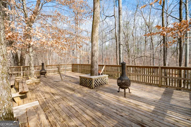 front view of house with potted plants