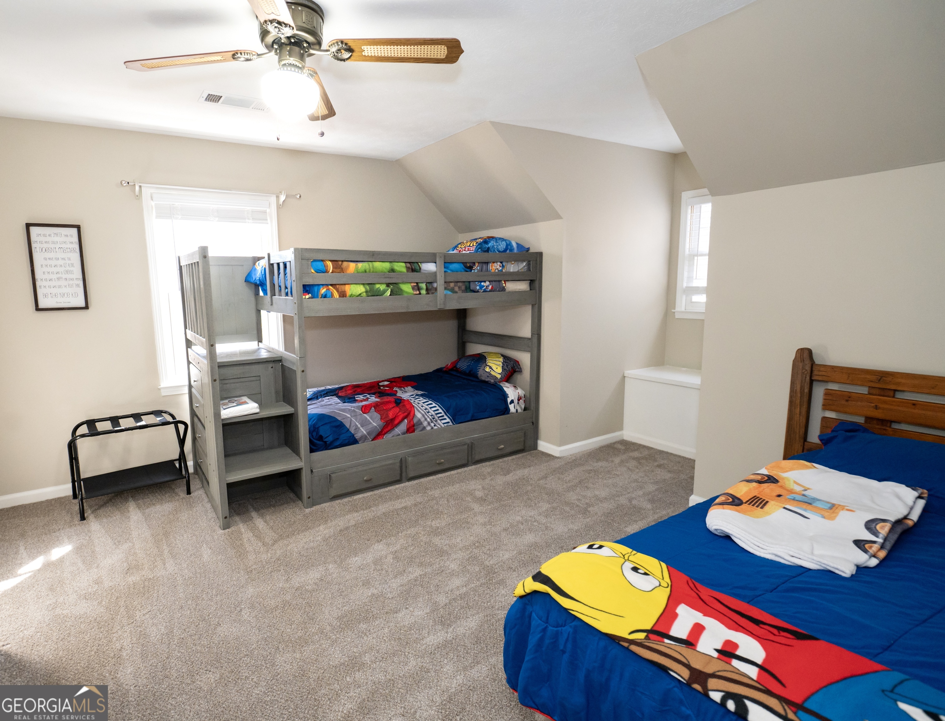 371 Mountain Hill Road Fortson, GA 31808 - Photo 5 of 42 a bedroom with a bed and a chandelier