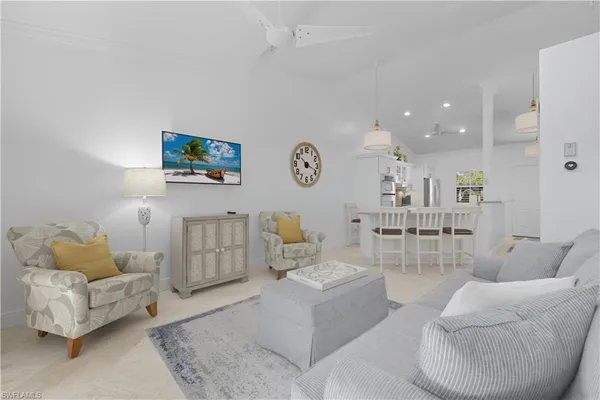 a living room with furniture and a table