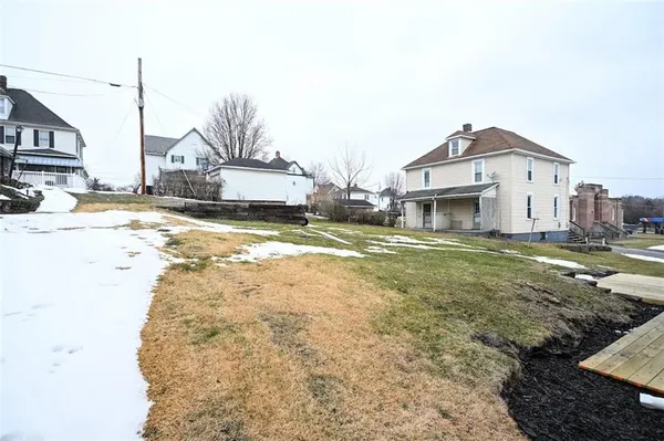 a view of a town with large house