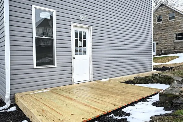 a view of a backyard of a house