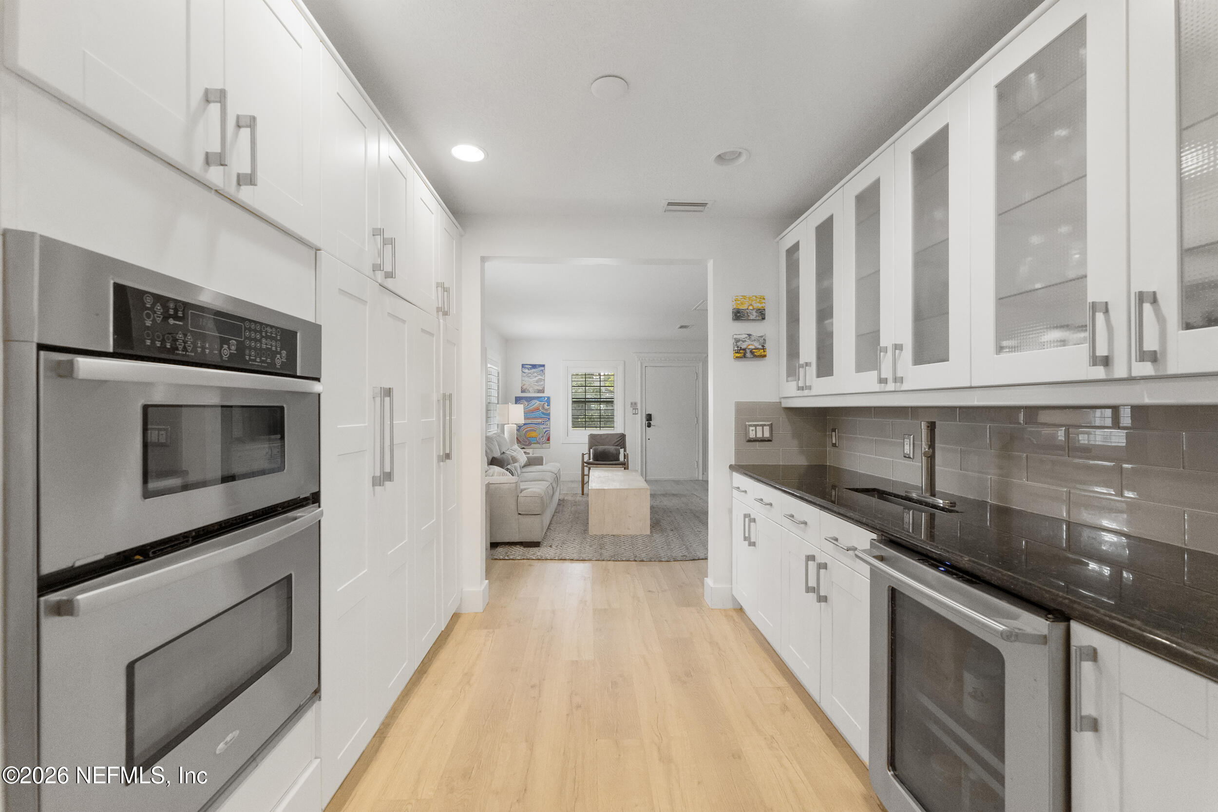 331 10th Street Atlantic Beach, FL 32233 - Photo 9 of 70 a large kitchen with stainless steel appliances granite countertop a stove and a sink
