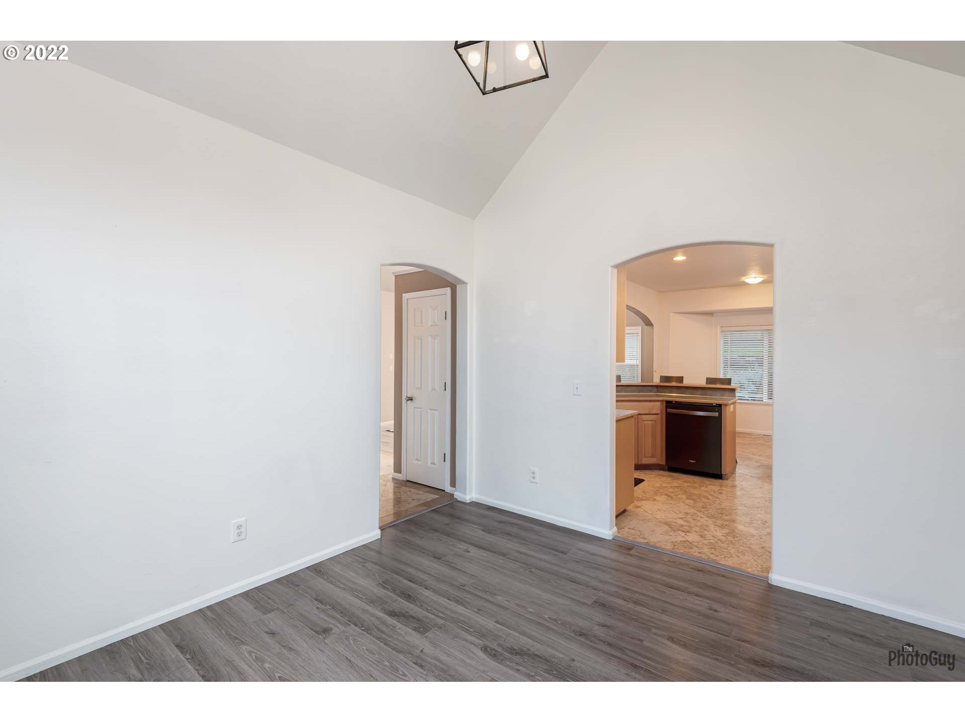 818 South 67th Street Springfield, OR 97478 - Photo 13 of 32 a view of a kitchen cabinets and wooden floor