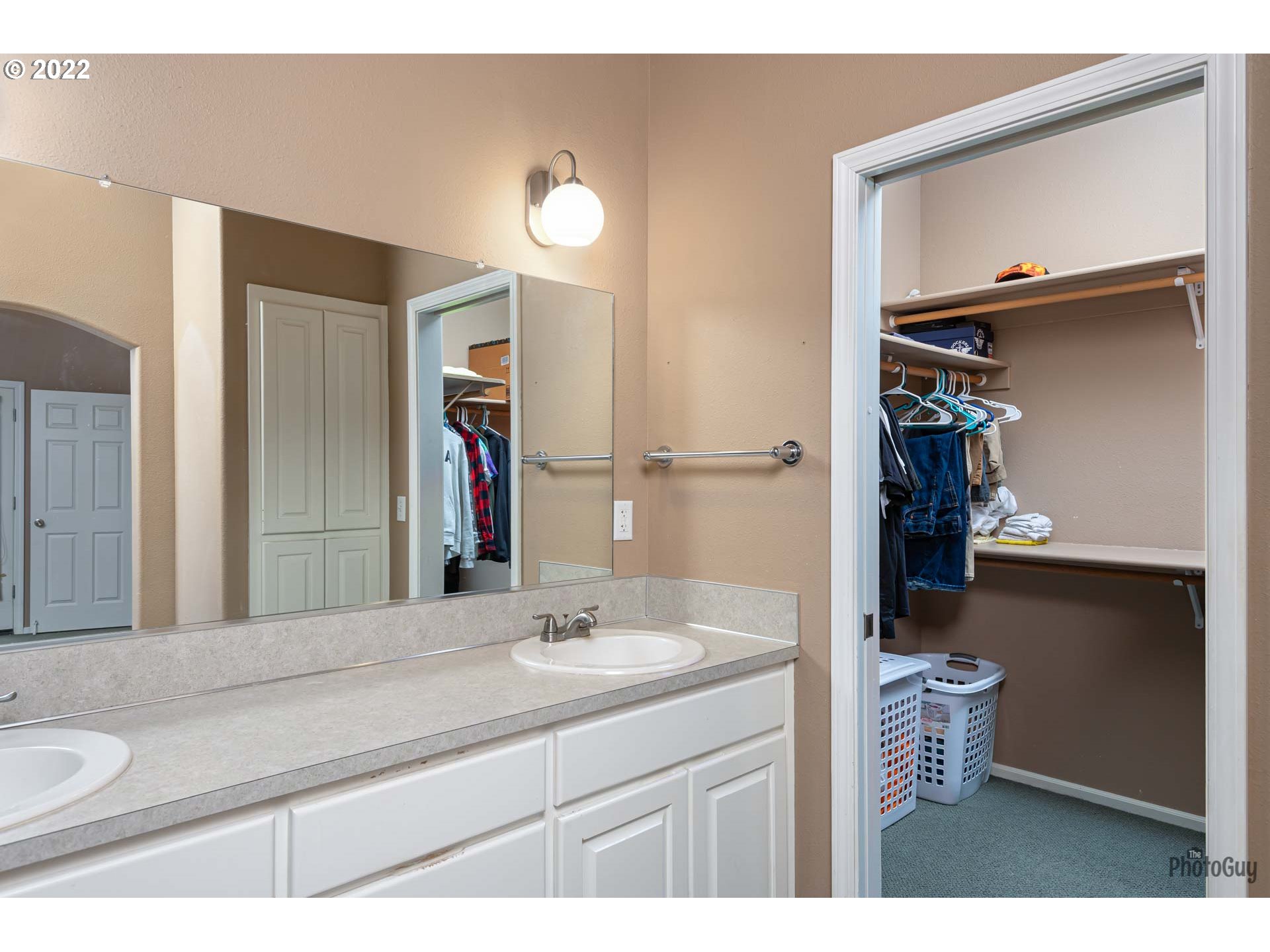 818 South 67th Street Springfield, OR 97478 - Photo 18 of 32 a bathroom with a sink and a mirror