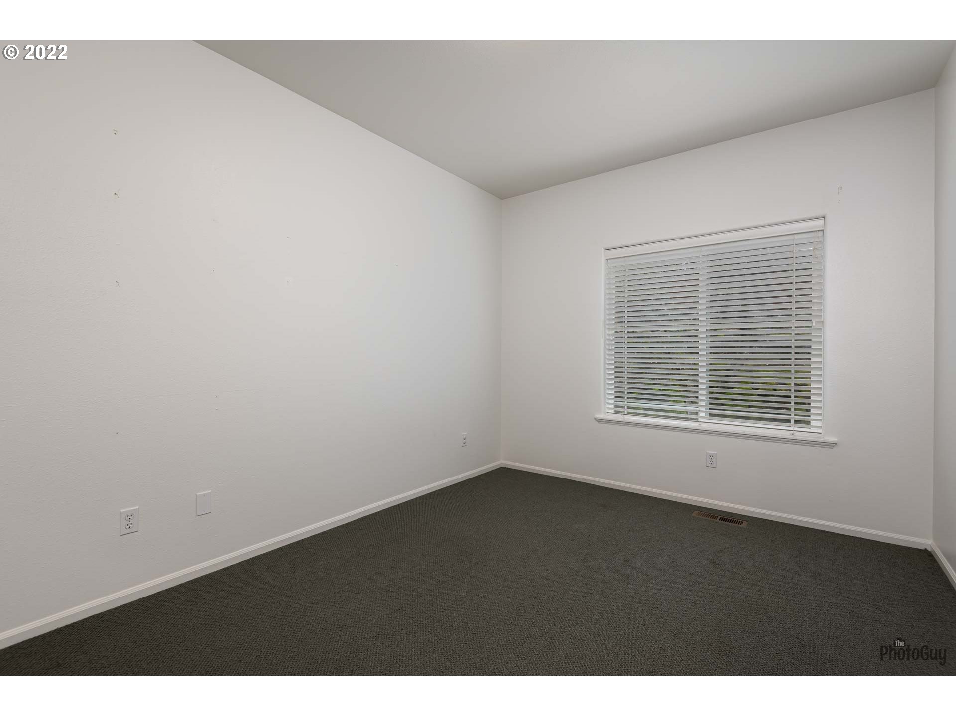 818 South 67th Street Springfield, OR 97478 - Photo 23 of 32 a view of an empty room with a window