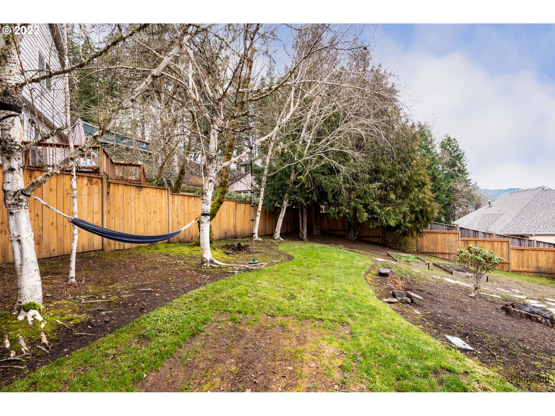818 South 67th Street Springfield, OR 97478 - Photo 32 of 32 a backyard of a house with yard and outdoor seating