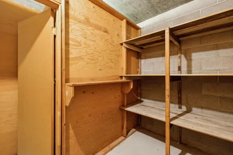 a view of balcony with a chair and the door