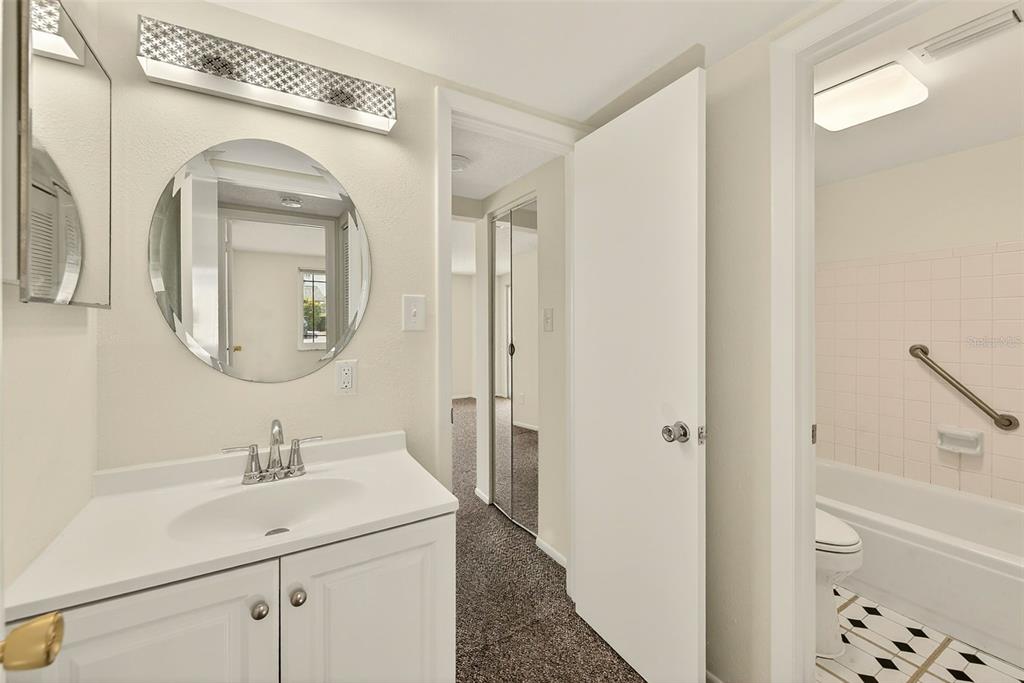 3422 Trophy Boulevard New Port Richey, FL 34655 - Photo 11 of 23 a bathroom with a sink a toilet and shower