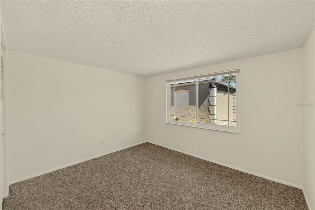 3422 Trophy Boulevard New Port Richey, FL 34655 - Photo 13 of 23 a view of an empty room with a window