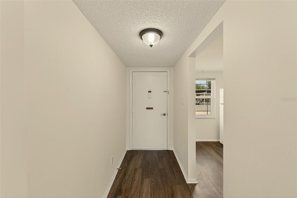 3422 Trophy Boulevard New Port Richey, FL 34655 - Photo 2 of 23 a view of a hallway