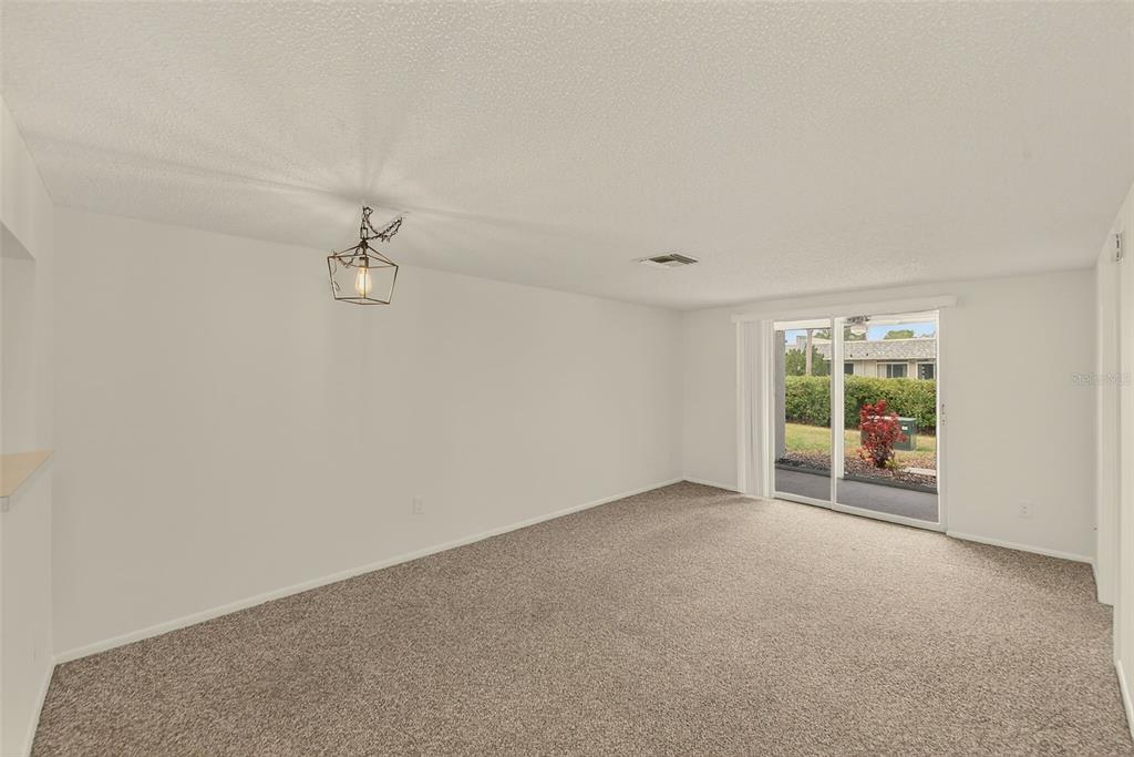 3422 Trophy Boulevard New Port Richey, FL 34655 - Photo 3 of 23 an empty room with a window