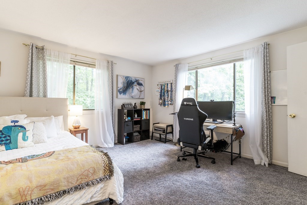 46 Mountain Gate Road, Unit 46 Ashland, MA 01721 - Photo 7 of 14 a bedroom with a bed a desk and chair