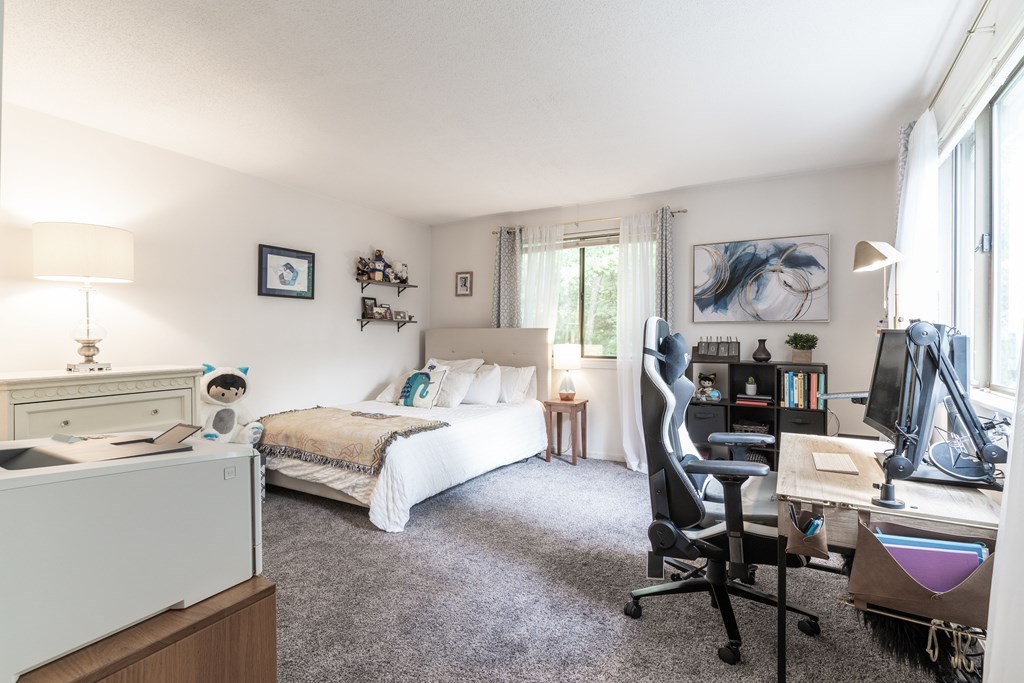 46 Mountain Gate Road, Unit 46 Ashland, MA 01721 - Photo 8 of 14 a living room with furniture and a window
