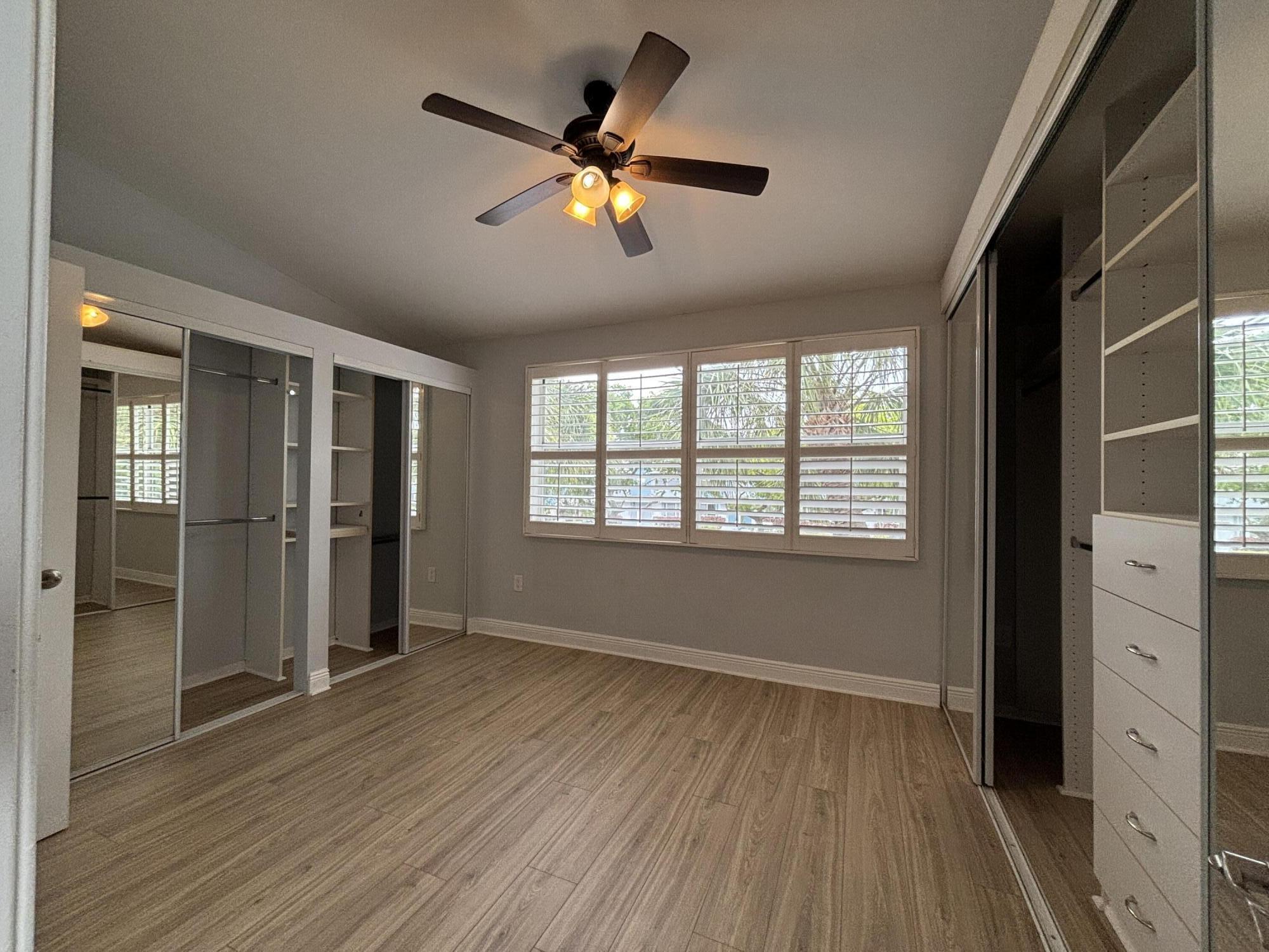 830 Jeffery Street, Unit 830 Boca Raton, FL 33487 - Photo 19 of 28 2nd master w/full wall built-ins