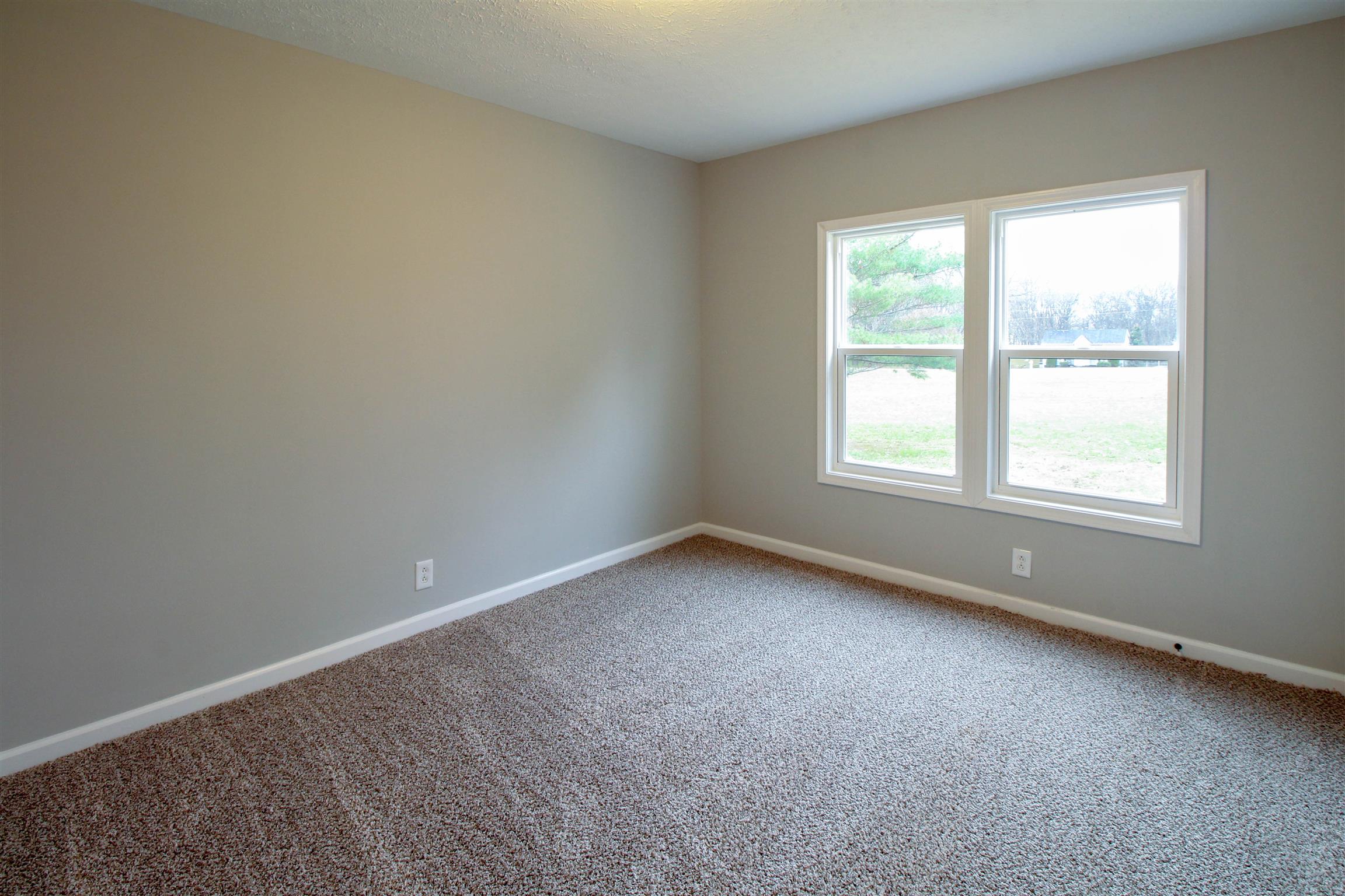 5647 Hopewell Road Springfield, TN 37172 - Photo 8 of 12 an empty room with a window