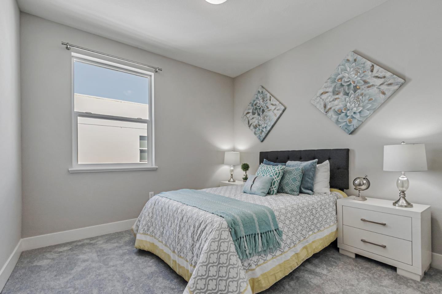 1633 Centre Pointe Drive Milpitas, CA 95035 - Photo 17 of 38 a bedroom with a bed and a window