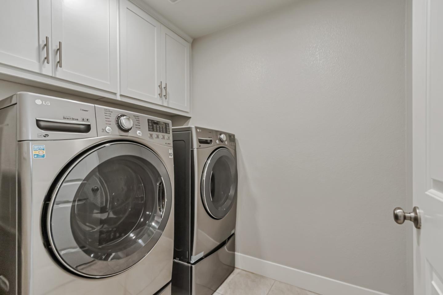 1633 Centre Pointe Drive Milpitas, CA 95035 - Photo 27 of 38 a utility room with dryer and washer