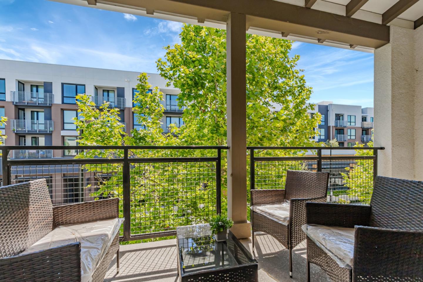 1633 Centre Pointe Drive Milpitas, CA 95035 - Photo 29 of 38 a room with furniture and a potted plant