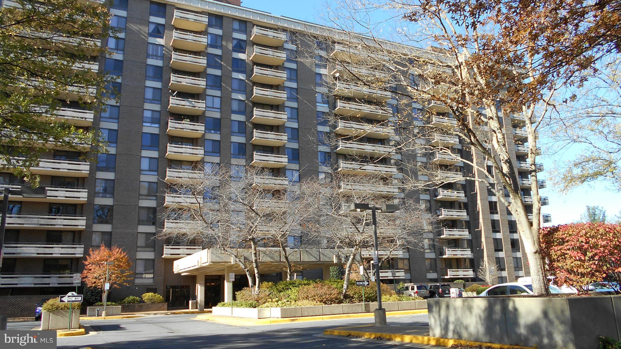 1808 Old Meadow Road, Unit 1003 McLean, VA 22102 - Photo 1 of 22 a front view of a building with street view