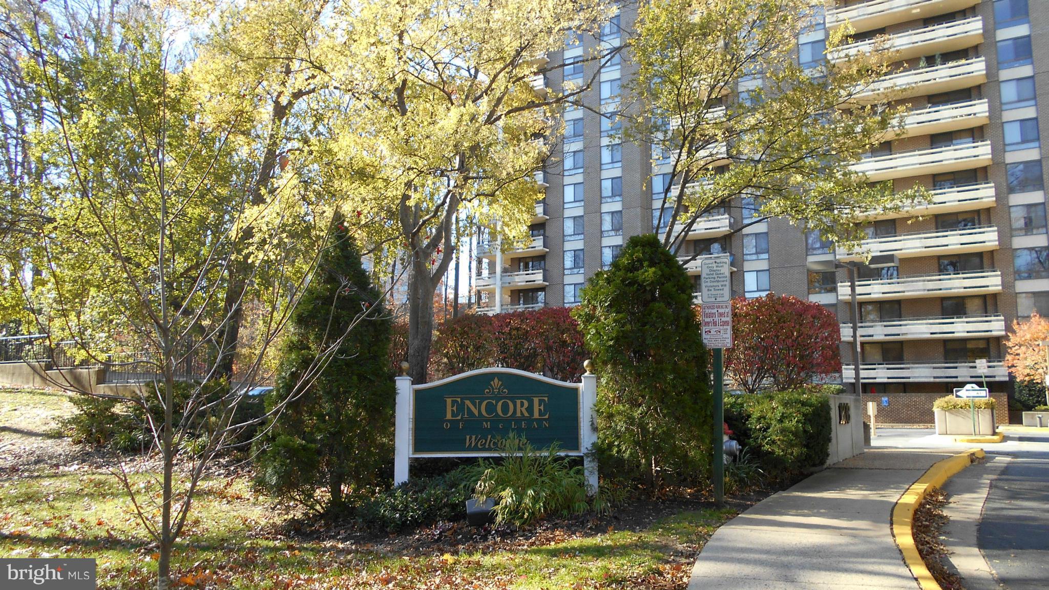 1808 Old Meadow Road, Unit 1003 McLean, VA 22102 - Photo 2 of 22 a sign on the side of a road