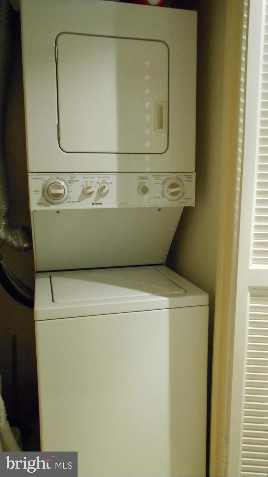 1808 Old Meadow Road, Unit 1003 McLean, VA 22102 - Photo 11 of 22 a utility room with dryer and washer