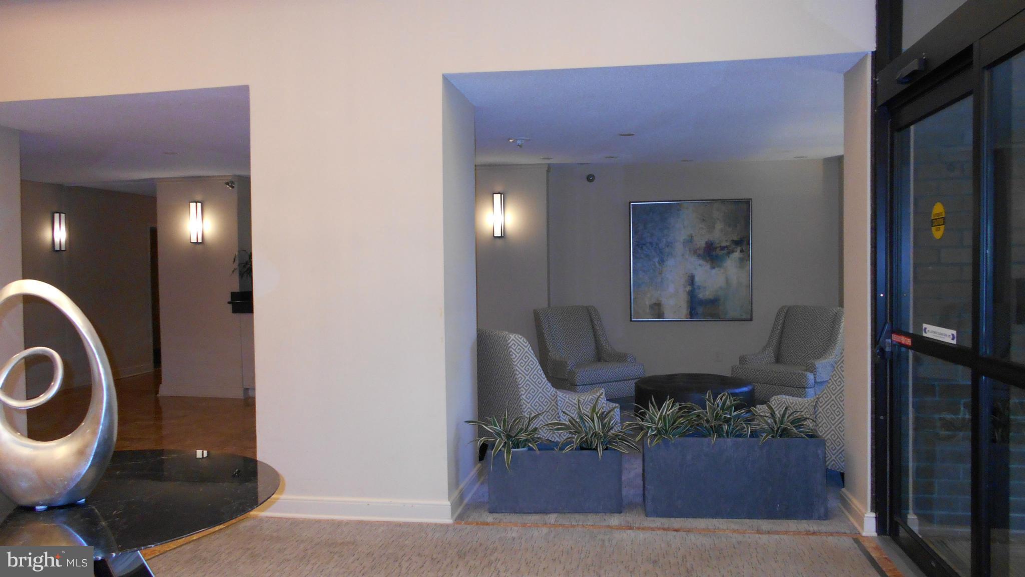 1808 Old Meadow Road, Unit 1003 McLean, VA 22102 - Photo 18 of 22 a view of a hallway with entryway