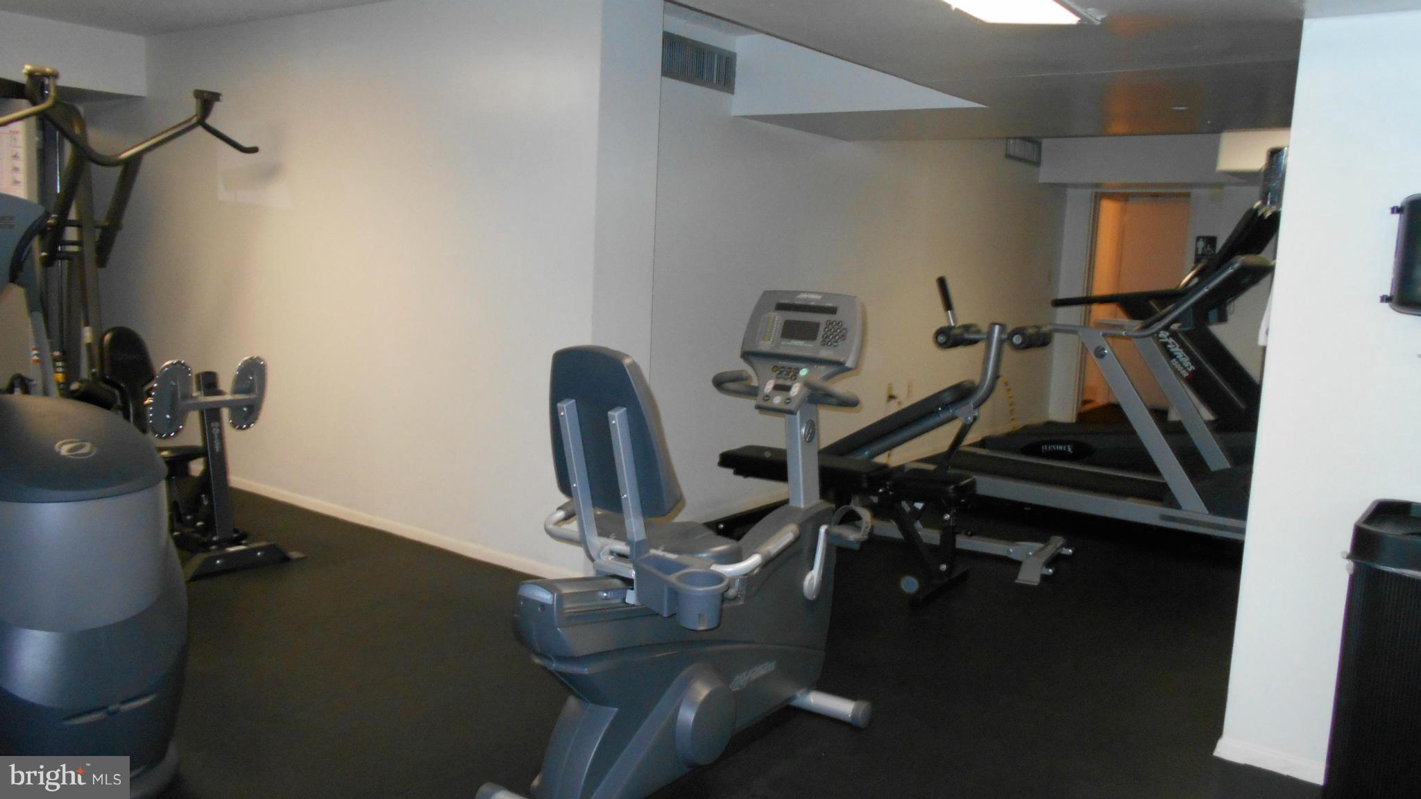 1808 Old Meadow Road, Unit 1003 McLean, VA 22102 - Photo 19 of 22 a view of a room with gym equipment