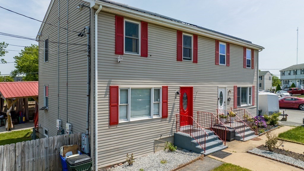 22 Michael Street, Unit 22 Fall River, MA 02721 - Photo 1 of 28 a backyard of a house with seating space
