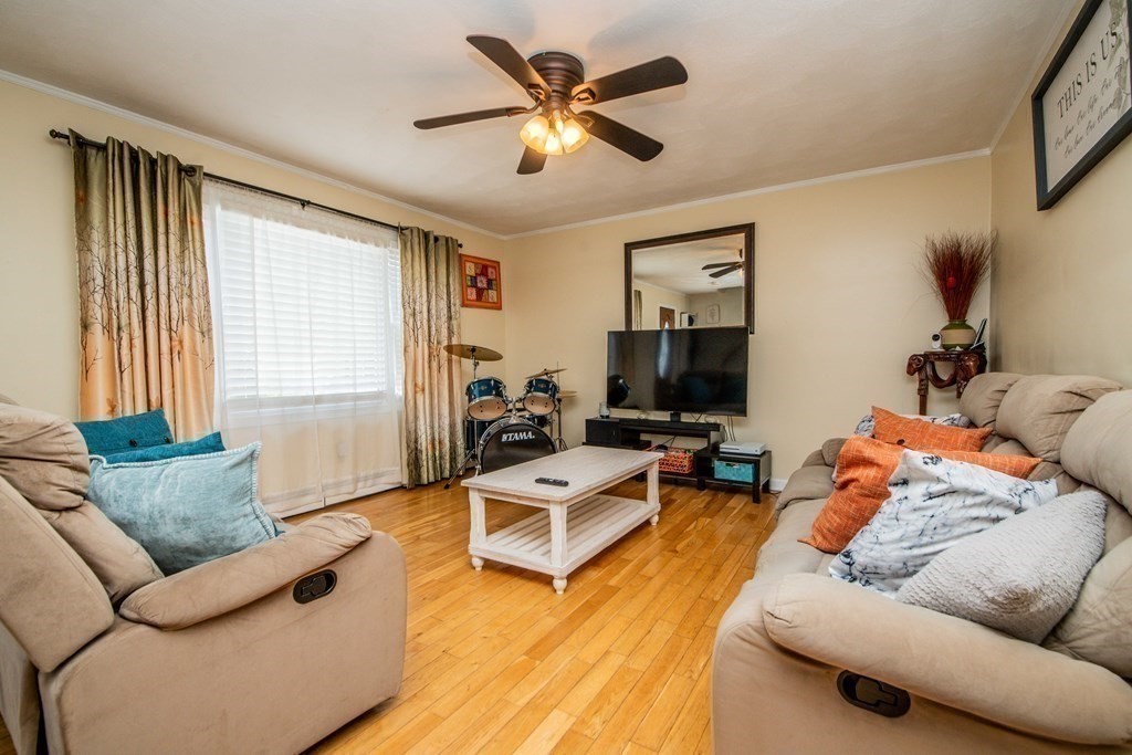 22 Michael Street, Unit 22 Fall River, MA 02721 - Photo 14 of 28 a living room with furniture and a flat screen tv