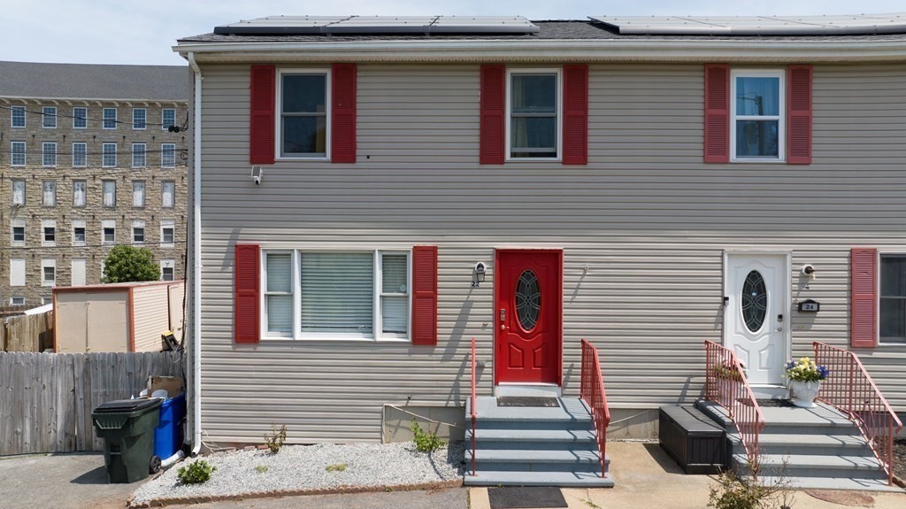 22 Michael Street, Unit 22 Fall River, MA 02721 - Photo 2 of 28 a front view of a house with a garage