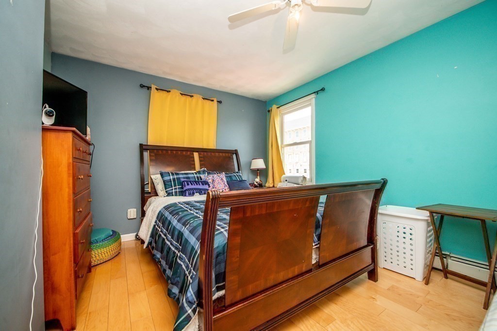 22 Michael Street, Unit 22 Fall River, MA 02721 - Photo 21 of 28 a bed room with a bed and a window
