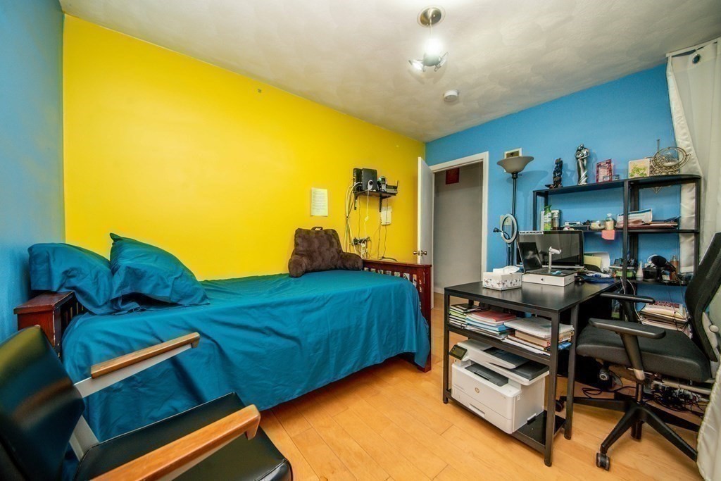 22 Michael Street, Unit 22 Fall River, MA 02721 - Photo 22 of 28 a bedroom with a bed and a tv