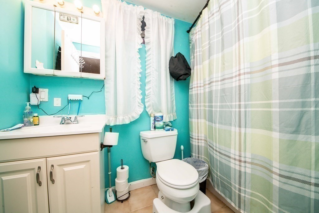 22 Michael Street, Unit 22 Fall River, MA 02721 - Photo 26 of 28 a bathroom with a sink toilet and shower